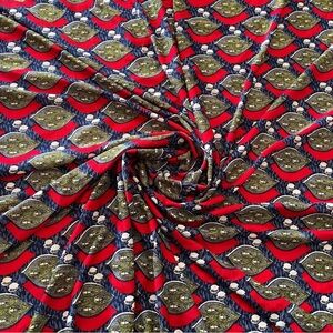 Vibrant Red and Green Patterned Stretchy Fabric